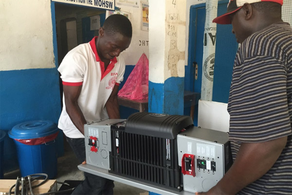 The new inverter being installed at Foequelleh Clinic